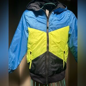 Reversible rain jacket and puffer